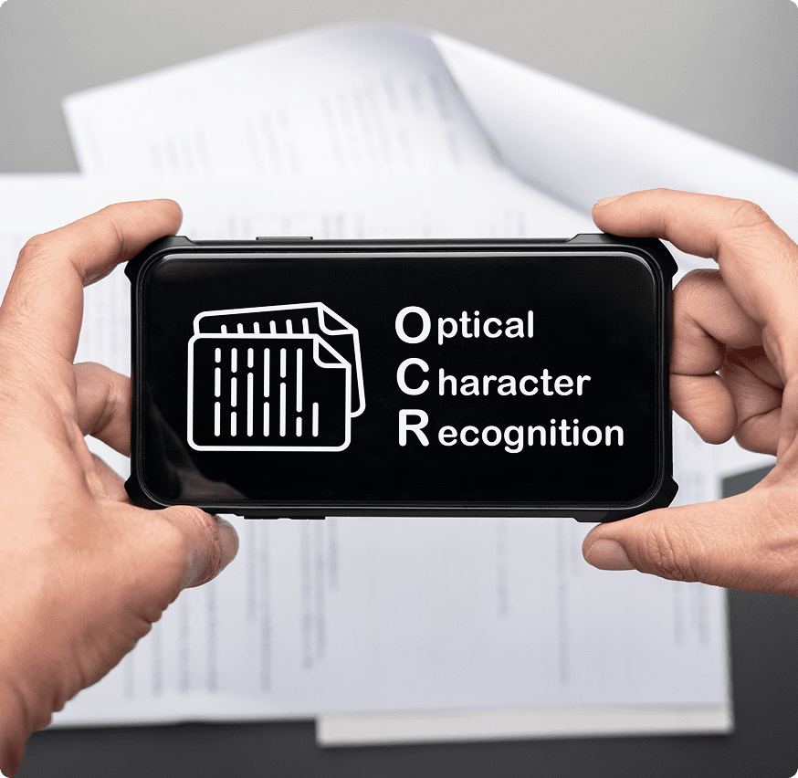 Hands holding phone with OCR display